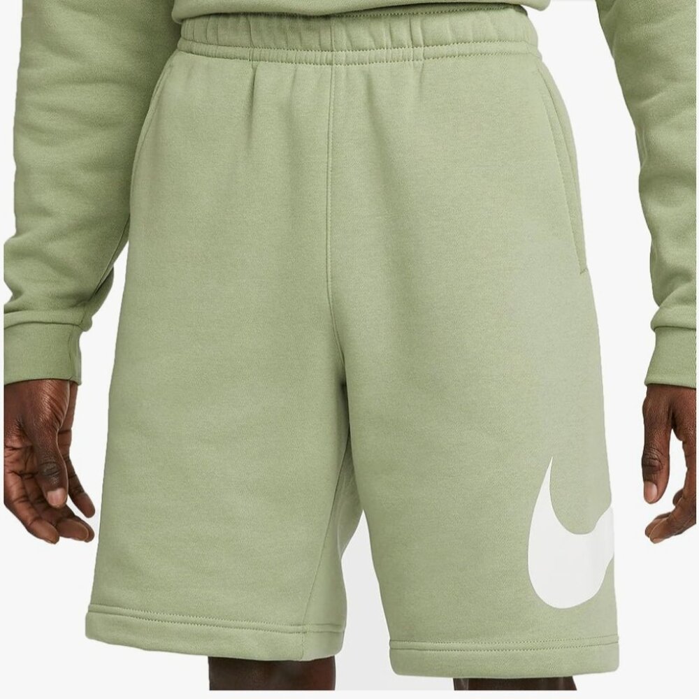 Nike green shorts/ sportswear club